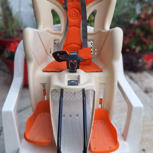 Child Bicycle Seat used, frame-mounted with adjustable footrests and safety belt