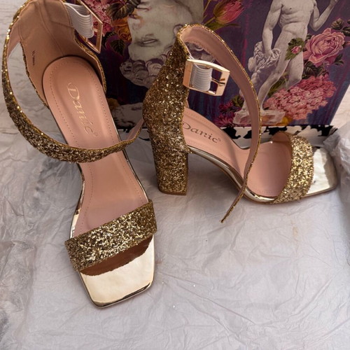 Danic No 37 heels used, gold color in very good condition