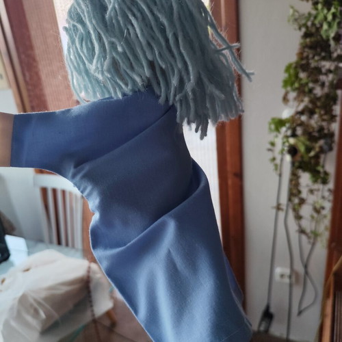 Handmade doll for collectors or puppet theatre on wooden base