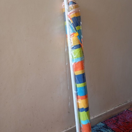Beach umbrella multicolored like new