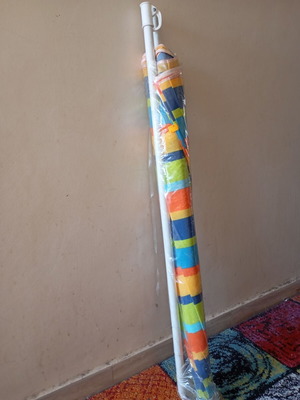 Beach umbrella multicolored like new