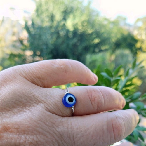 Handmade steel ring with blue evil eye