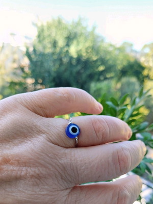 Handmade steel ring with blue evil eye