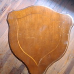 Coffee table used shield-shaped with carved legs