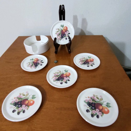 Vintage bakelite coasters like new with fruit design