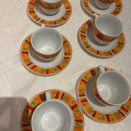 Vintage set of 6 cups and 6 saucers with bright colors, unused