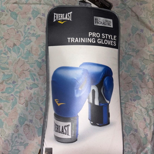 Everlast gloves and shin guards used