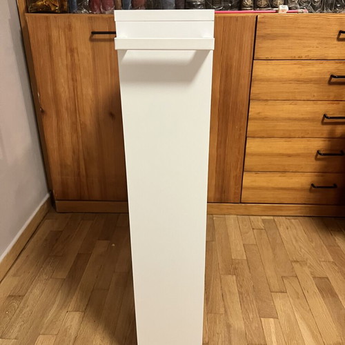 White kitchen shelf unit with adjustable shelf and wheels
