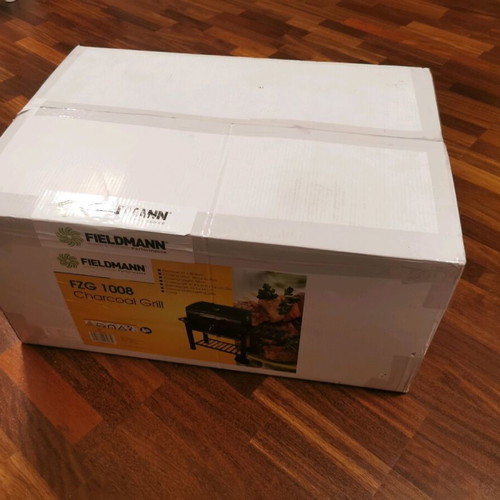 Charcoal grill new with lid, thermometer and adjustable charcoal height