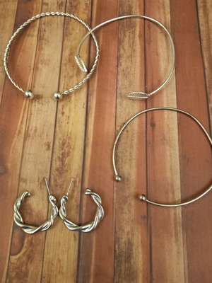 Set of hoop earrings and bracelets like new, 1 pair of earrings with 3 silver bracelets