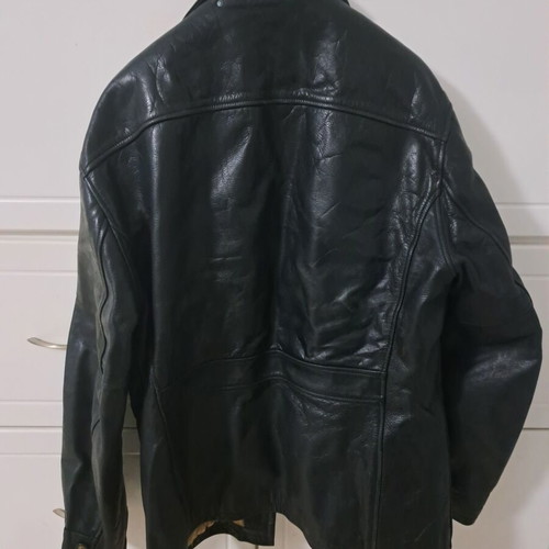 Leather jacket used, size large, black, 100% genuine