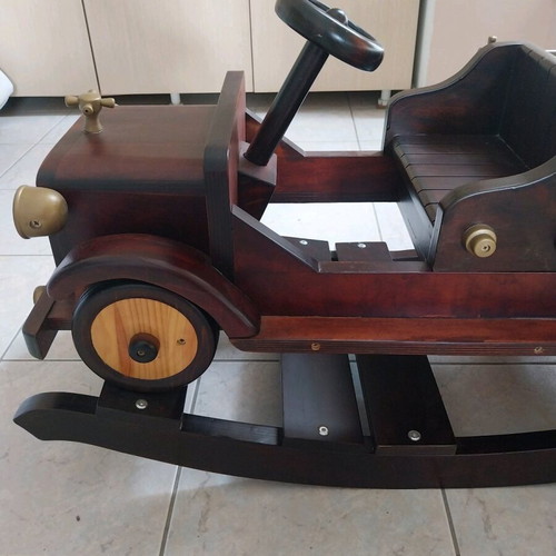 Rocking wooden car made of beech and pine