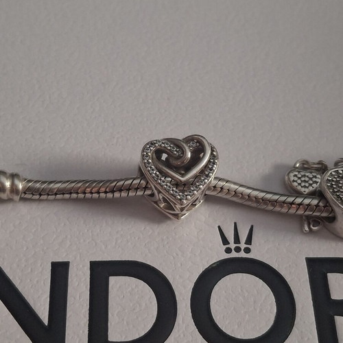 Pandora charm heart with linked hearts decorated with zircon stones, like new