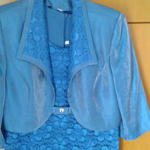 Women's suits like new, sizes 48-50, gray and blue