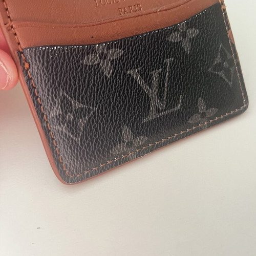 Louis Vuitton leather card holder used, black and brown