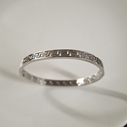 Steel handcuff bracelet in silver tone