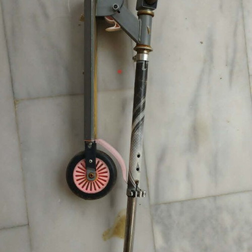 Foldable children's scooter used