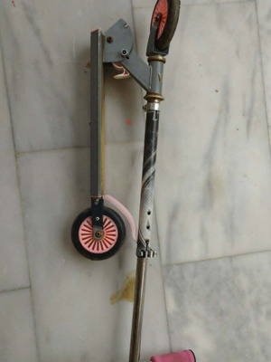 Foldable children's scooter used