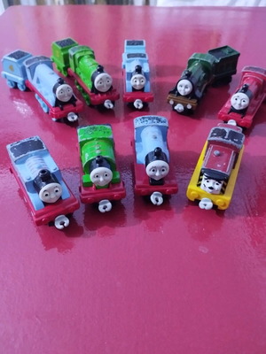 Set of nine used Thomas and Friends trains with carriages