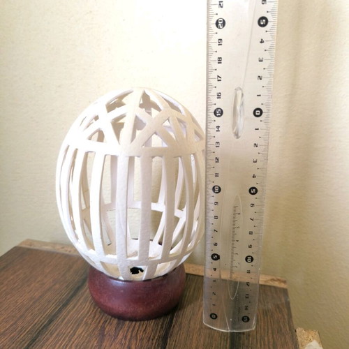 Carved decorative eggshell used from ostrich-camel egg