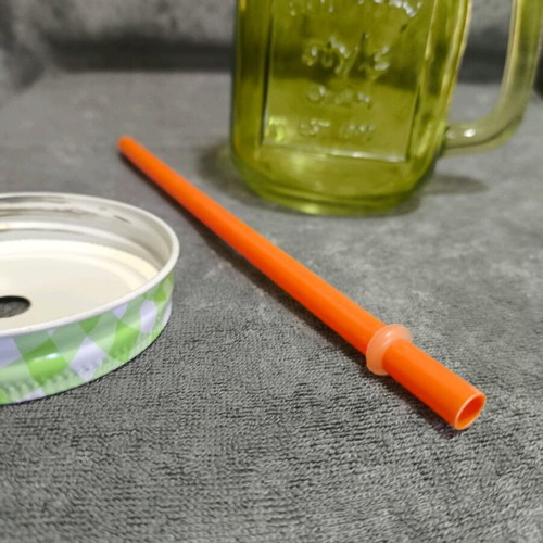 Glass cup with straw used, straw needs replacement
