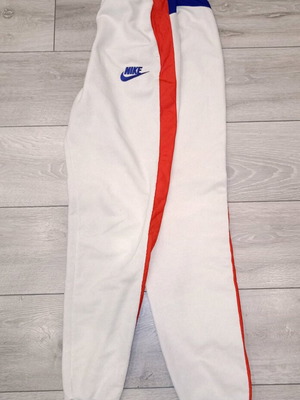 Nike fleece track pants used, beige with red and blue details, size M