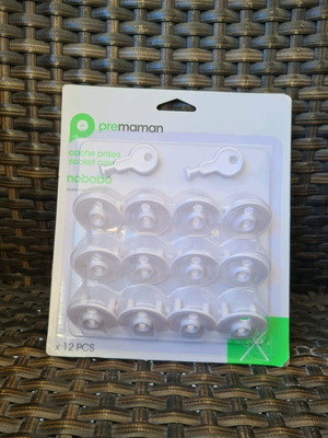 Premaman socket protectors new, pack of 12 with removal key