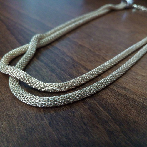 Double chain necklace used, gold color, versatile design