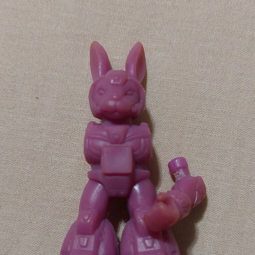 Teratomachos purple rabbit figure used with one arm