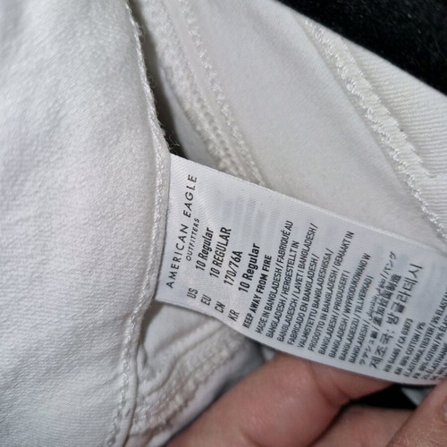 American Eagle white jeans like new, size L with asymmetric hem