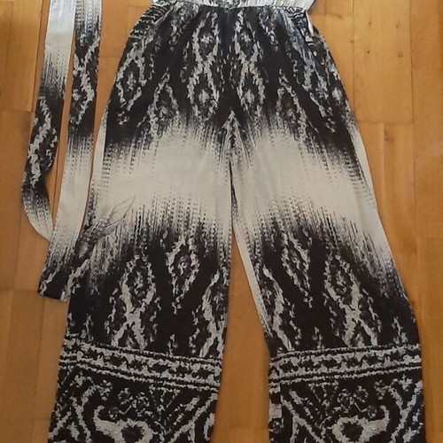 Jumpsuit black and white like new with adjustable straps and belt