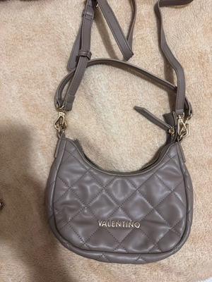 Valentino bag used with small issue on upper corners