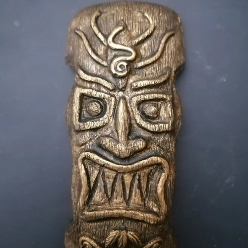 Handmade gypsum magnets and hanging totems painted with acrylics