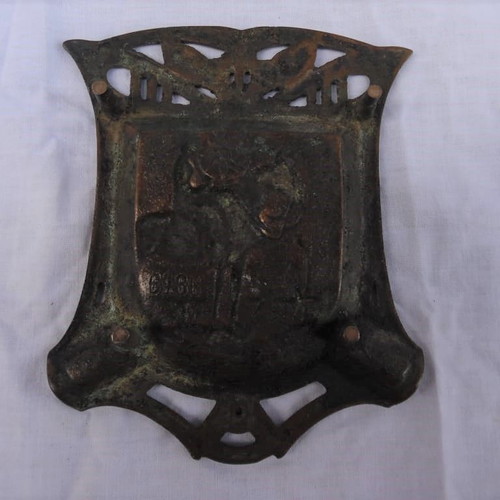 Large solid brass carved ashtray with embossed figure