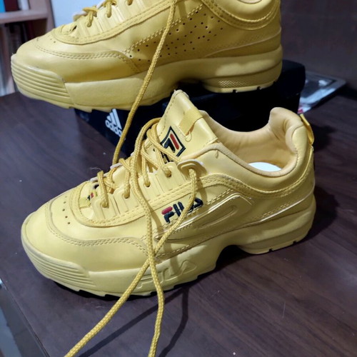 Fila athletic shoes yellow size 38 like new