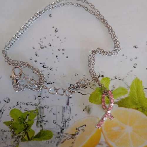 Pink stainless steel pendant like new, breast cancer awareness symbol
