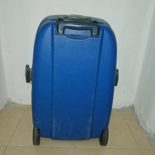 Hard plastic suitcase with lock and wheels