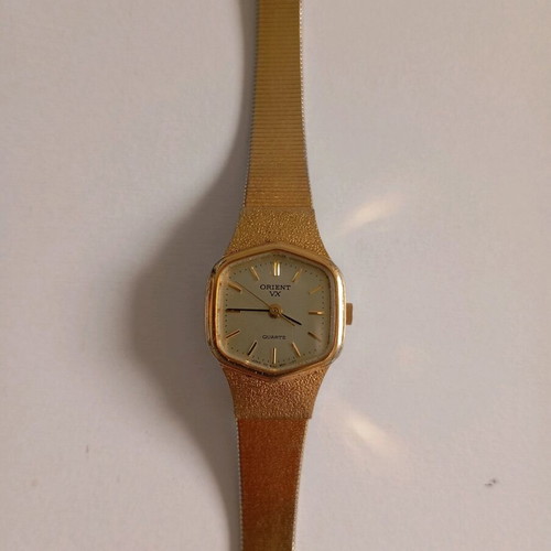 Orient vintage women's watch used, gold color, needs repair