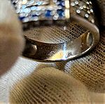  Λευκόχρυσο δαχτυλίδι 14Κ με ζαφείρια και ζιργκόν, 4.94γρ., νούμερο 56.5.