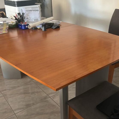 Solid wood dining table designed by Eleni Natsi