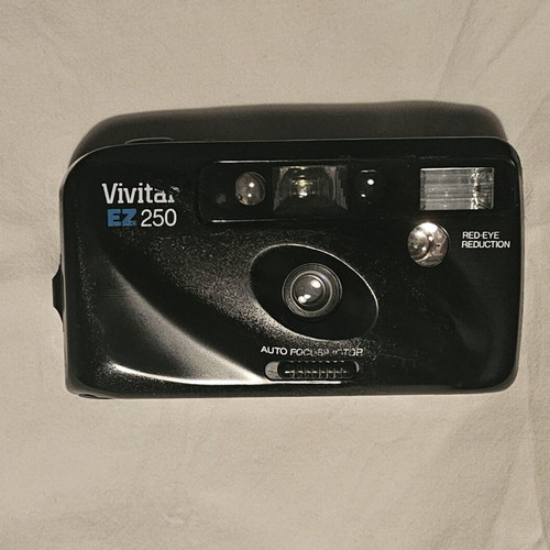 Vivitar 35mm EZ250 camera used with flash and red eye reduction