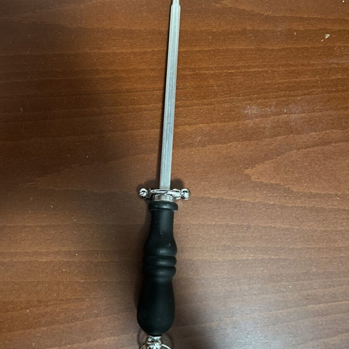 Knife sharpening steel with long rod and ergonomic handle