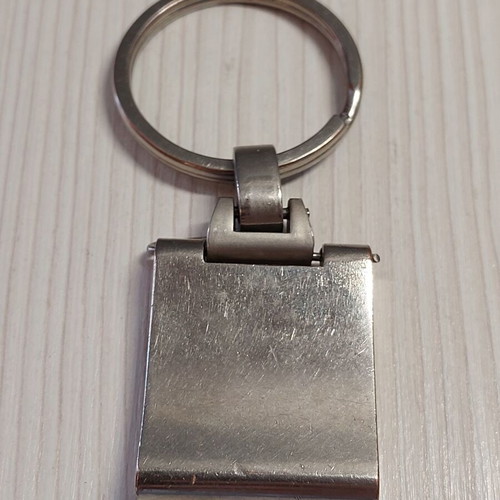 Metal Mercedes-Benz keychain used, blue and silver