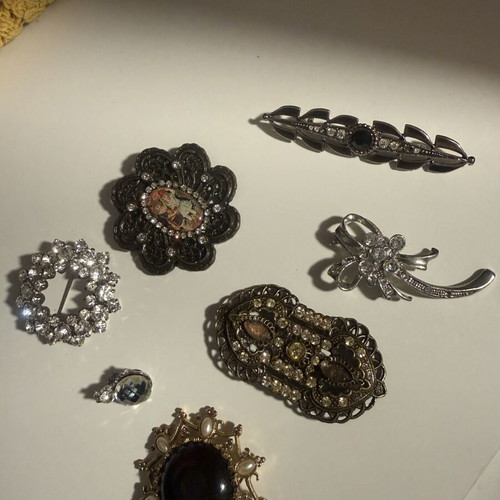 Vintage costume jewelry pins with rhinestones and real stones, new