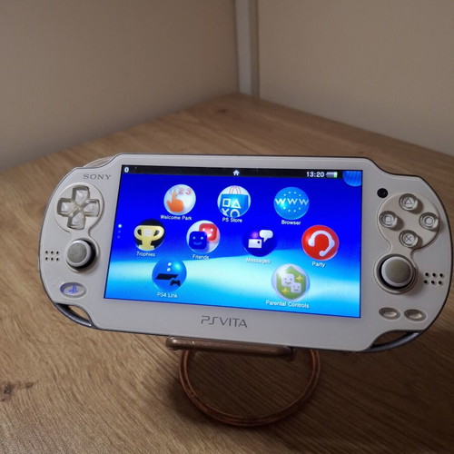 Sony PlayStation Vita 1000 OLED White like new with 8GB card and charging cable