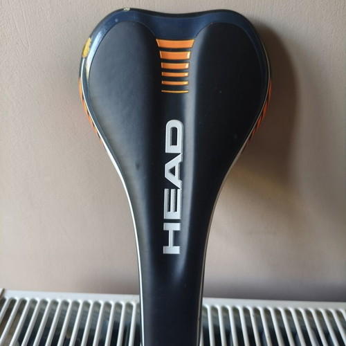Bicycle saddle for MTB used, 300 grams, slight tear on right side