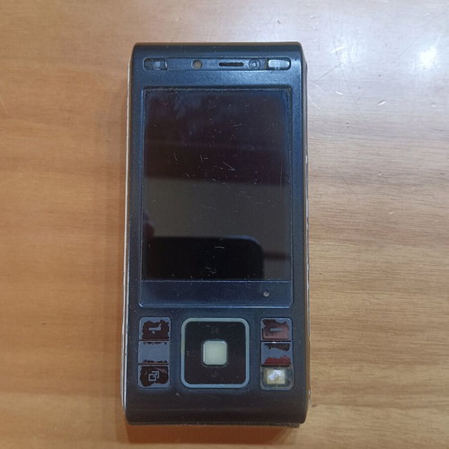 Sony Ericsson C905 used, non-working, with charger and USB cable