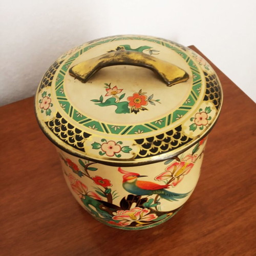 Vintage metal container used with lid and tropical bird decoration