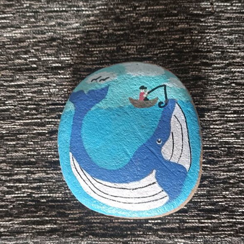 Painted stone new with acrylics and glossy varnish