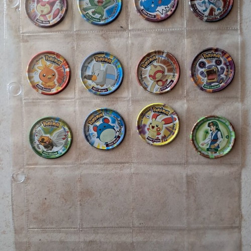 Various Pokémon, Megaman, Yugioh, Transformers caps.
